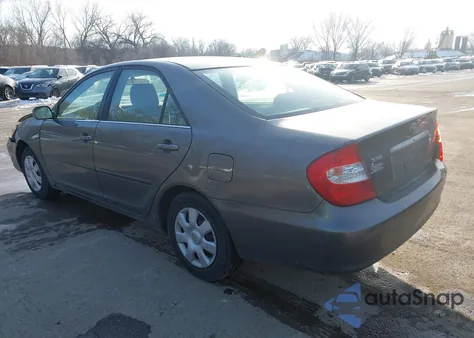 2003 Toyota Camry Le z USA, uszkodzony, nr VIN 4T1BE32K23U705725
